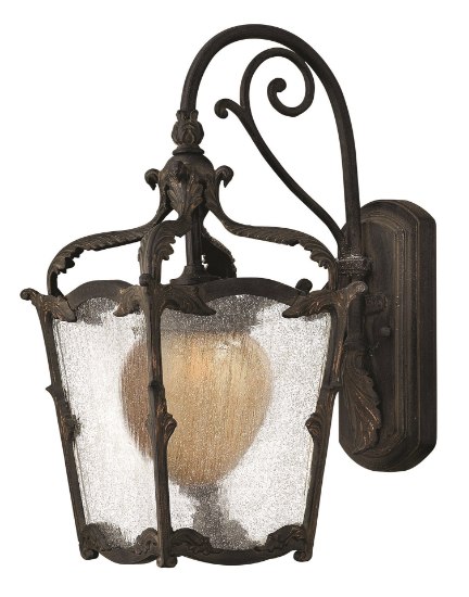 Picture of 100w Outdoor Sorrento MED Clear Seedy and Optic Etched Amber Aged Iron Small Wall Mount